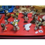 Goebel- Twelve glazed matt pottery birds to include blue titmouse, yellow hammer, penguin.
