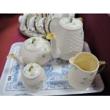 Belleek Pottery Four Piece Tea Service, comprising teapot, hot water jug, cream jug and sugar