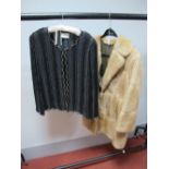 A Light Beige Three-Quarter Length Fur Coat, of wrap over design, hook fastening, 88cms long; a