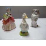 A Royal Doulton Figurine 'Cissie' HN1809, a Royal Copenhagen standing Pekingese dog (numbered