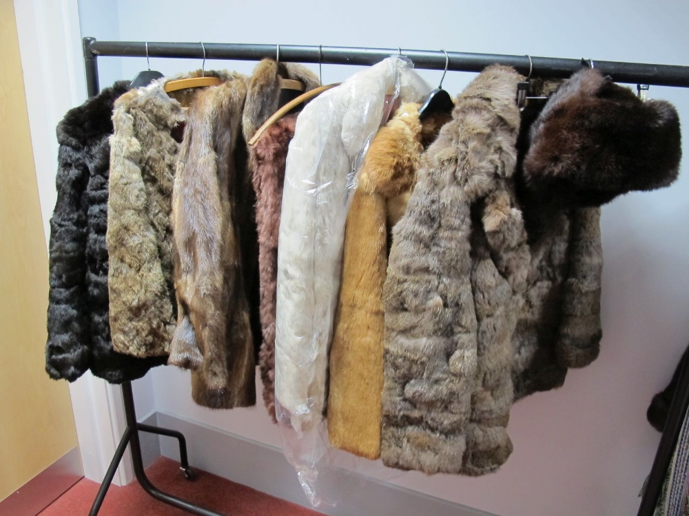 Six Rabbit Fur Coats, various styles and shades; together with a Russian labelled fur hat with ear