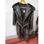A Dark Brown Full Length Mink Coat, with collar and tie belt to waist, 107cms long.
