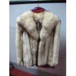 A Short Fox Fur Jacket, shawl collar, each section interlinked with suede panel, 65cms long.