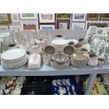 A Large Collection of Poole, Two-Tone Dinner and Tea Ware, including coffee and tea pots, jugs,