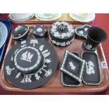 Wedgwood Black Jasperware, plate, trinket boxes, dishes etc., all decorated with classical