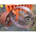 Two Victorian Multi Spoked Cast Iron Pulley Wheels, 106cms and 75cms diameters. (2)