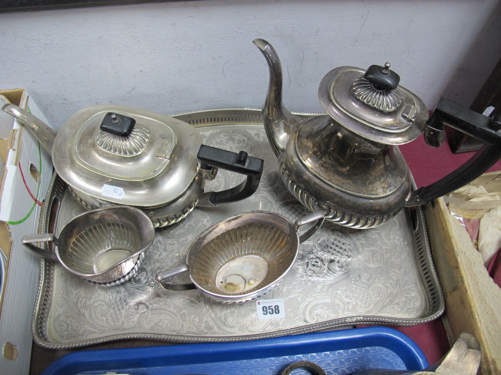 A Plated Four Piece Teaset, each of semi reeded form; together with a rectangular plated tray. (5)