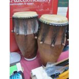 Two African 'Kambala' Kpanlogo Drums, carved wooden bodies with taught stringed skins, 66 and