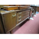 An E.Gomme for G Plan 1970's Sideboard, with three drawers flanked by cupboard doors.