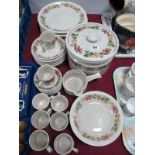 Wedgwood Pottery "Quince" Pattern, Eight Piece Dinner Service, decorated with a band of fruit, forty