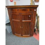 XIX Century Inlaid Mahogany Corner Wall Cupboard, with bowed front, twin panelled doors and shaped