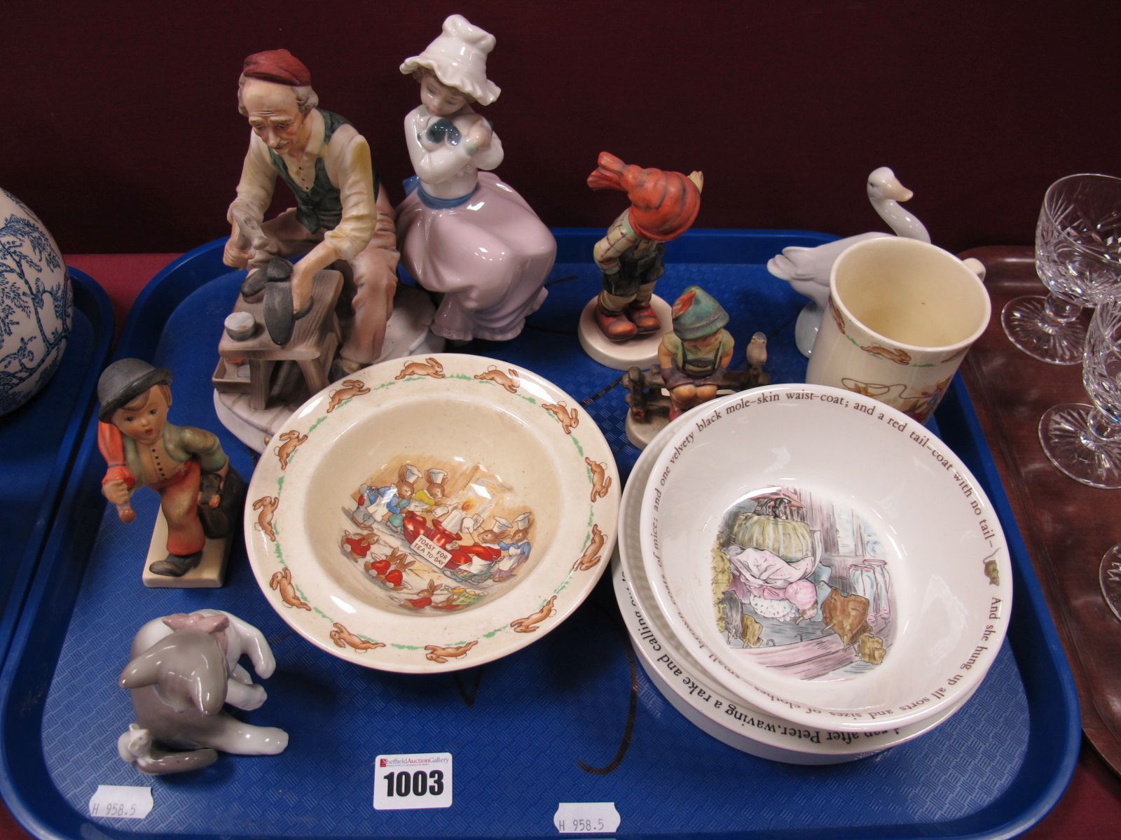 Lladro Figure Group, of a cat and mouse, Nao figure of seated girl and puppy, "Bunnykins" Royal
