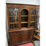 A Reproduction Mahogany Wall Unit, detil cornice over twin lancet arched glazed doors flanking