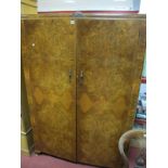 Mid XX Century Walnut Wardrobe, with twin doors, on squat cabriole legs, pad feet.