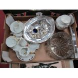 An Electroplated Circular Dished Tray, pierced foliate borders, a plated pedestal and basket,