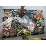 A Large Mixed Lot of Assorted Costume Jewellery:- One Box