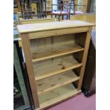 Pine Bookcase, with a moulded edge, reeded sides, adjustable shelves, bracket feet.