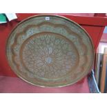A Mid XX Century Large Indo-Persian Circular Brass Tray, with engraved geometric decoration, 96cms