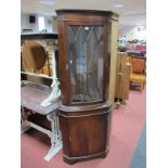 XX Century Mahogany Double Corner Cupboard, with glazed astragal door, over cupboard on bracket