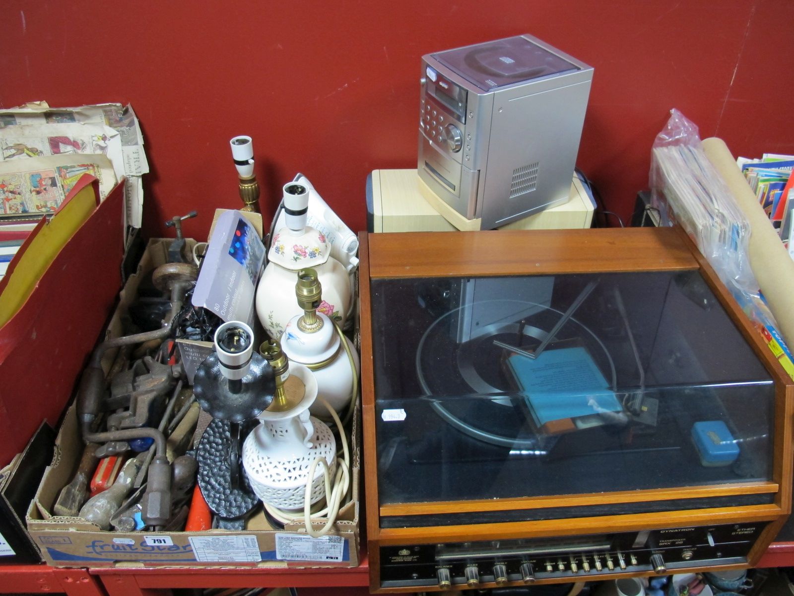 A Dynatron SRX-26 Turntable, a Sanyo mini CD system, tools, table lamp bases, indoor/ outdoor