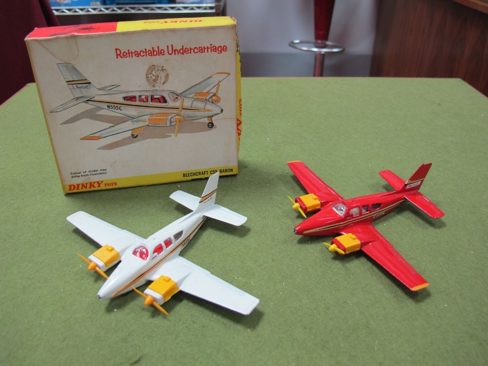 Two Dinky no. 715 Beechcraft CSS Baron, One Red/Yellow, one White/ Yellow. Both Good plus / Very
