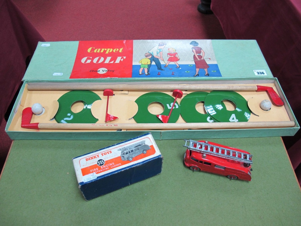Dinky Toy No 555 Fire Engine, fair, boxed, plus a boxed Chad Valley golf game.