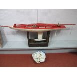 A 2nd Half XX Century Pond Yacht, wooden construction, 115cms long with mast and keel, in need of