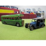 Two Post War Minic Tinplate Vehicles. A35M Taxi and 52M green line single decker bus. Both playworn.
