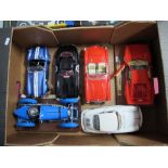 Six Diecast 1:18 Scale Diecast Sports Cars, Burago Ferrari GTO (1984) on wooden display plinth,