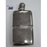 A Hallmarked Silver Hipflask, with hinged top and removable base cup, monogrammed.