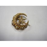 An Edwardian Pearl and Diamond Crescent and Star Brooch, stamped "18ct".