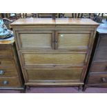 An Early XX Century Mahogany Three Heights Bookcase, later twin hinged top over twin cupboard