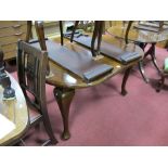 An Early XX Century Mahogany Dining Table, the oval top with moulded edge, on cabriole legs and