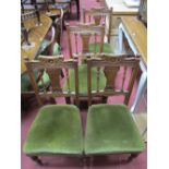 A Set of Early XX Century Four Walnut Chairs, with shaped and carved top rail, turned supports,