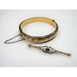 An Edwardian Style Bar Brooch, together with a "9ct Metal Core" bangle. (2)