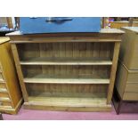 Pine Bookcase, top with a moulded edge, open shelves, reeded sides, plinth base.