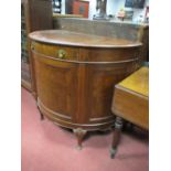 1920's Mahogany and Walnut Demi-Lune Sideboard, with single drawer over door on squat cabriole