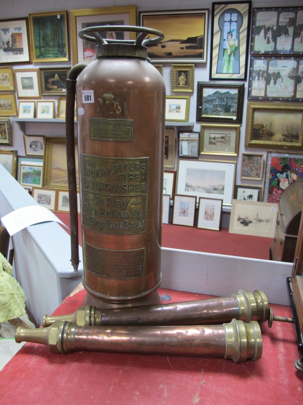 An Early XX Century "Underwriters" Copper and Brass Fire Extinguisher; together with a pair of "