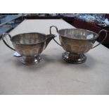 A Hallmarked Silver Jug and Sugar Bowl, each of panelled form, on circular spreading base.