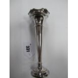 A Hallmarked Silver Vase, with flared rim, on circular spreading base (base weighted), boxed.