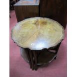 Mahogany Nest of Tables, comprising four quadrants housed in circular pie crust topped table (