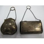 A Hallmarked Silver Ladies Purse, of shaped design with engraved decoration, on chain suspension