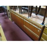 Teak Sideboard, with a cutlery drawer over two small drawers, twin cupboard doors, on chrome