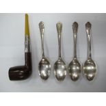 A Hallmarked Silver Mounted Pipe, together with a set of four 1910-1935 Commemorative spoons. (5)