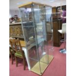 A Pair of Tall and Narrow Glass Display Cabinet, with interior shelving. (2)