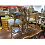 Set of Six (Four Single and Two Carvers) Mahogany Dining Chairs, each with pierced splat back on