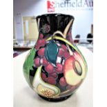 A Moorcroft Vase, decorated in the Queen's Choice design by Emma Bossons, shape 869/6, impressed and