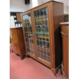 Early XX Century Mahogany Bookcase, the top with a moulded edge, with glazed leaded doors, 'H'