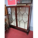 A 1920's Mahogany Display Cabinet, moulded top over twin astragal glazed doors, glass interior