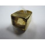 An 18ct Gold Single Stone Dress Ring, high rectangular set, within plain setting.